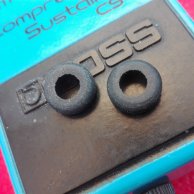 Set of two battery lid rubber grommets for Boss pedals.